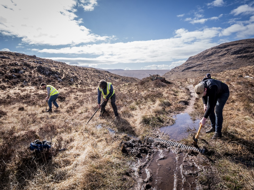 Trail managers use digital tools for path maintenance in remote landscapes. Mountain Bike United.