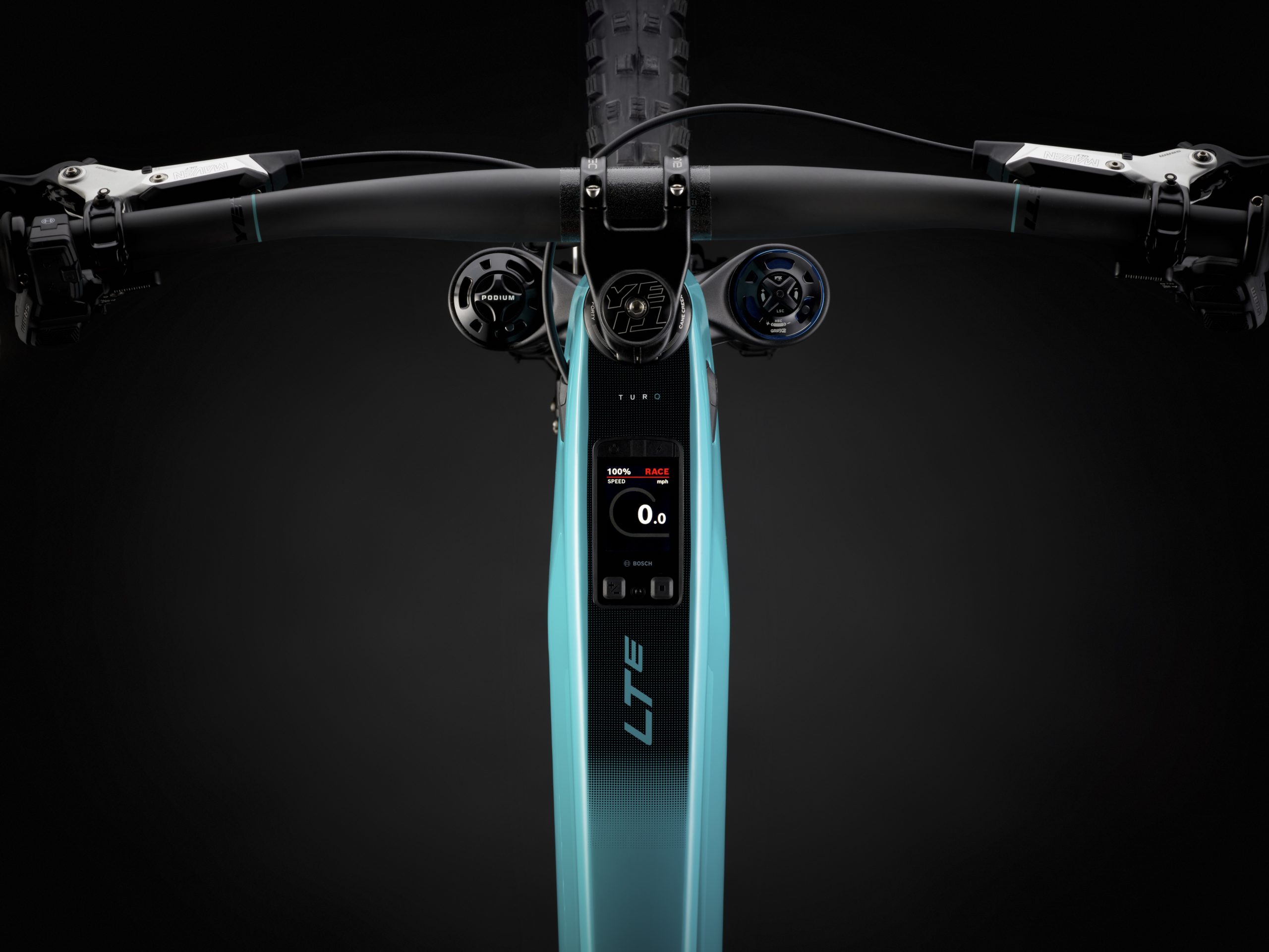 Electric bike handlebar with digital display showing speed, sleek design, and advanced controls. Ideal for urban cycling enthusiasts. Mountain Bike United.