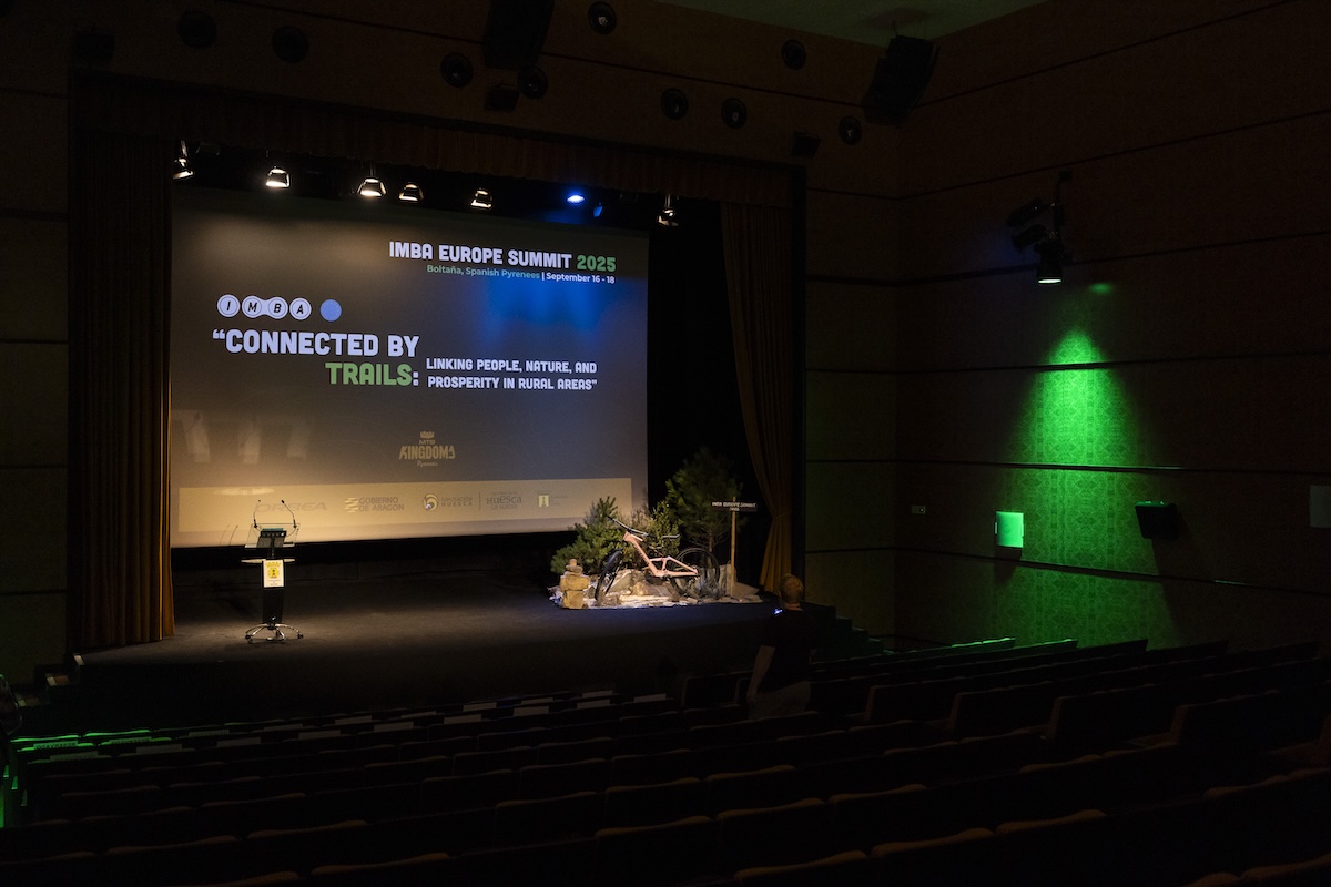 IMBA Europe Summit 2025 stage setup in Bolta&ntilde;a, Spanish Pyrenees. Mountain Bike United.