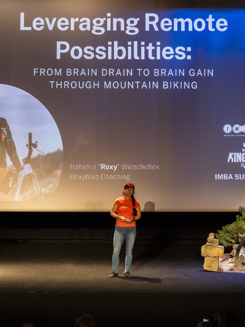 Speaker at IMBA Europe Summit 2025 discussing mountain biking benefits. Mountain Bike United.