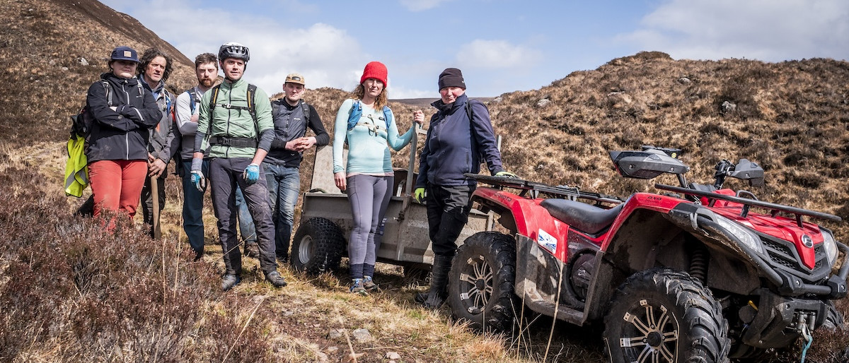 Trail association team managing mountain trail with equipment. Mountain Bike United.